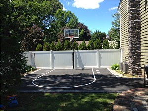 asphalt basketball court striped painted with key hoop